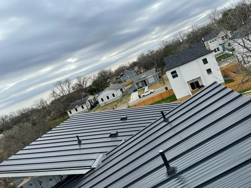 Standing seam metal roof panels with vents for Skylight Repair in Laketon